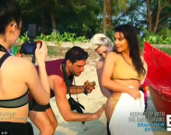 photo – 2 LUCKY MEN HAVE A FEEL OF KIM KARDASDHIAN’S GIGANTIC BACKSIDE